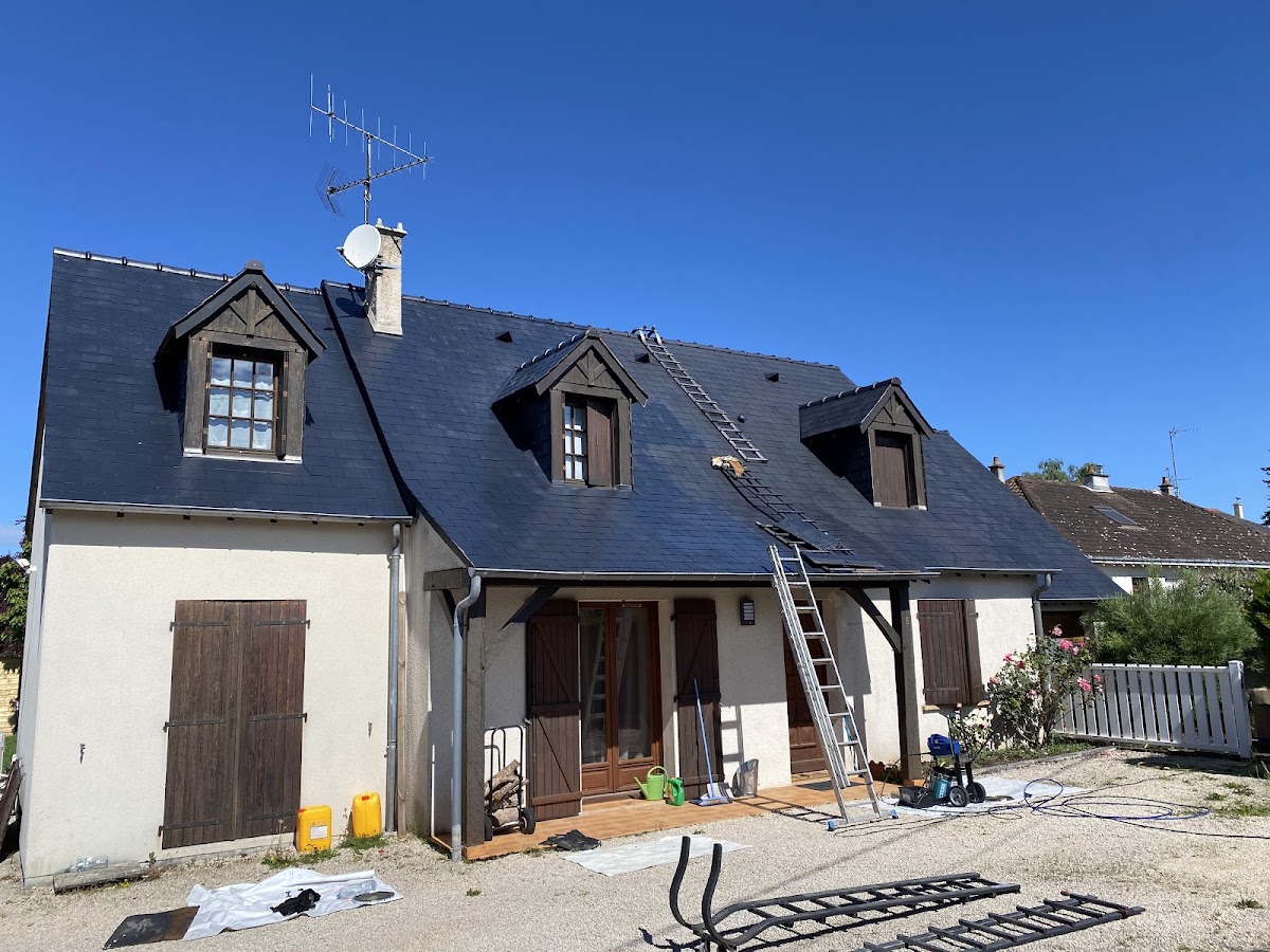 Réalisation Artisan Promasset : peinture extérieure de mur de clôture